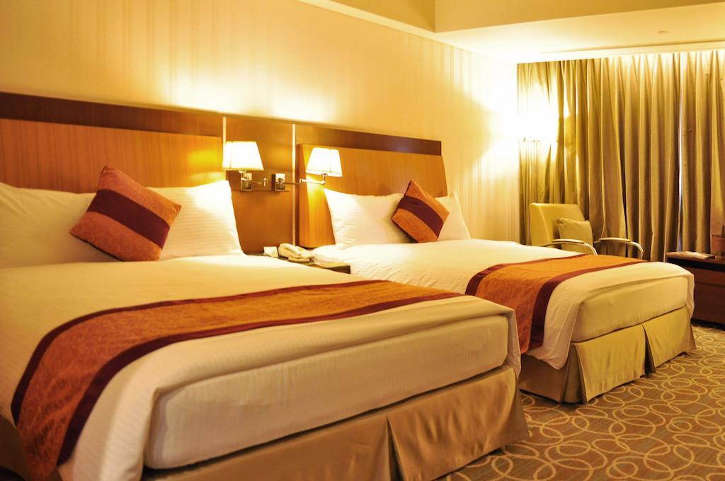 Evergreen Plaza Hotel - Tainan Cameră foto A room at the hotel